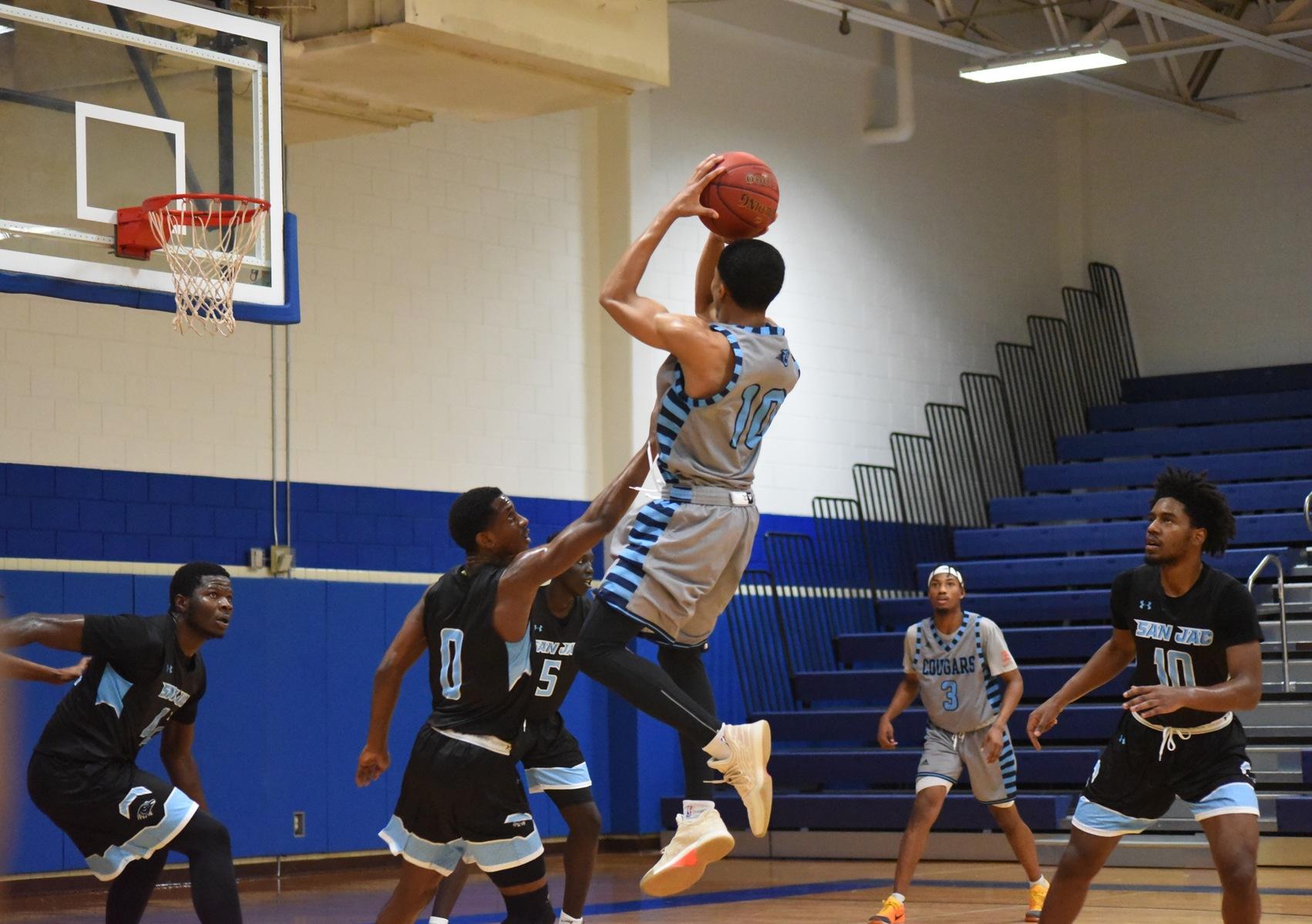 Cougars Clip Ravens